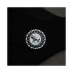 Jinherit Gentle Guardian elephant brooch pin shown on black fabric, highlighting vintage pearl detail, marbled ivory center, and meaningful animal brooch styling.
