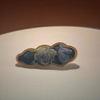 Jinherit Auspicious Cloud Song Brocade silk hair clip in Black Peony, highlighting dark brocade tones, floral woven texture, and a refined cloud-shaped hair accessory design.