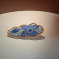 Jinherit Auspicious Cloud Song Brocade silk hair clip in Blue Floral, featuring blue floral brocade, a sculptural cloud silhouette, and a gold-tone flat alligator clip.