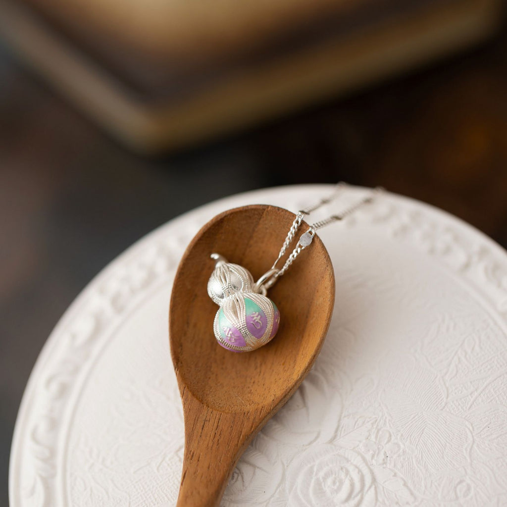 Jinherit Celestial Haze cloisonné enamel fine silver gourd necklace, featuring a 999 fine silver hulu pendant with cloud-toned enamel on a wooden spoon.