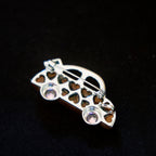 Jinherit Joyride wooden rose quartz car brooch back detail, showing the brooch pin construction, polished metal finish, open car outline, and secure wearable design.