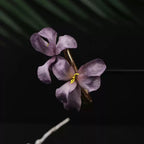 Jinherit Midnight Orchid Ronghua flower hair clip detail, highlighting the handmade silk orchid petals, soft velvet flower texture, and heritage-inspired botanical craftsmanship.