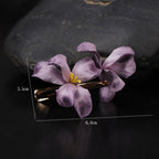 Jinherit Midnight Orchid Ronghua silk orchid hair clip product detail, featuring layered purple petals, dimensional floral shape, and refined handmade hair accessory finish.