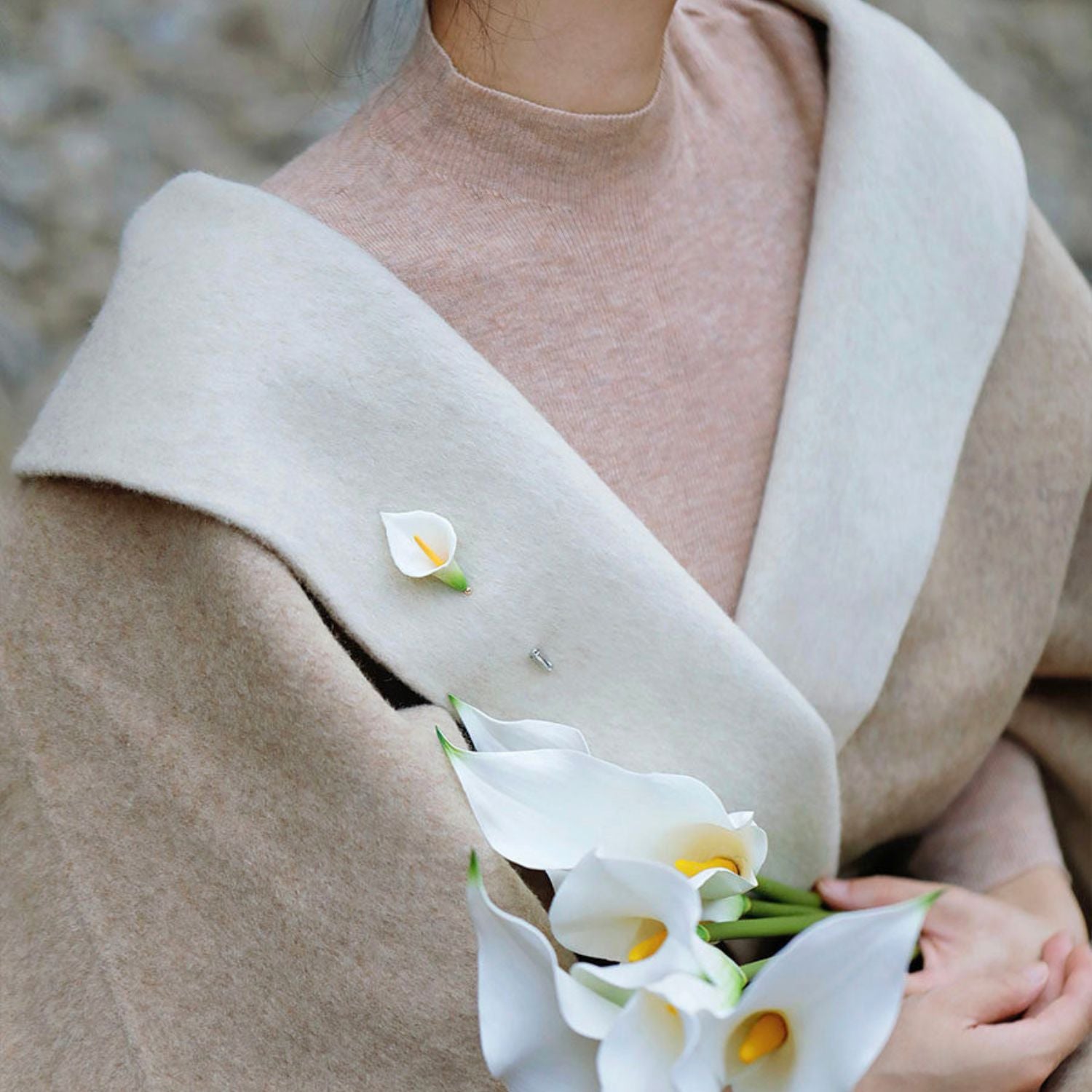Jinherit Quiet Bloom ceramic calla lily brooch pin worn on a soft scarf, styled as a feminine floral accessory for quiet luxury and elegant everyday wear.