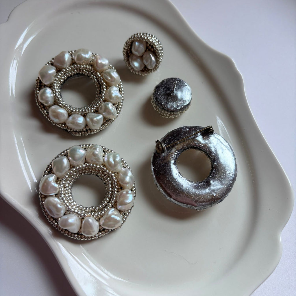 Jinherit Silver Halo baroque pearl embroidered brooch pin front and back detail, showing the pearl-beaded face and reinforced artisan backing construction.