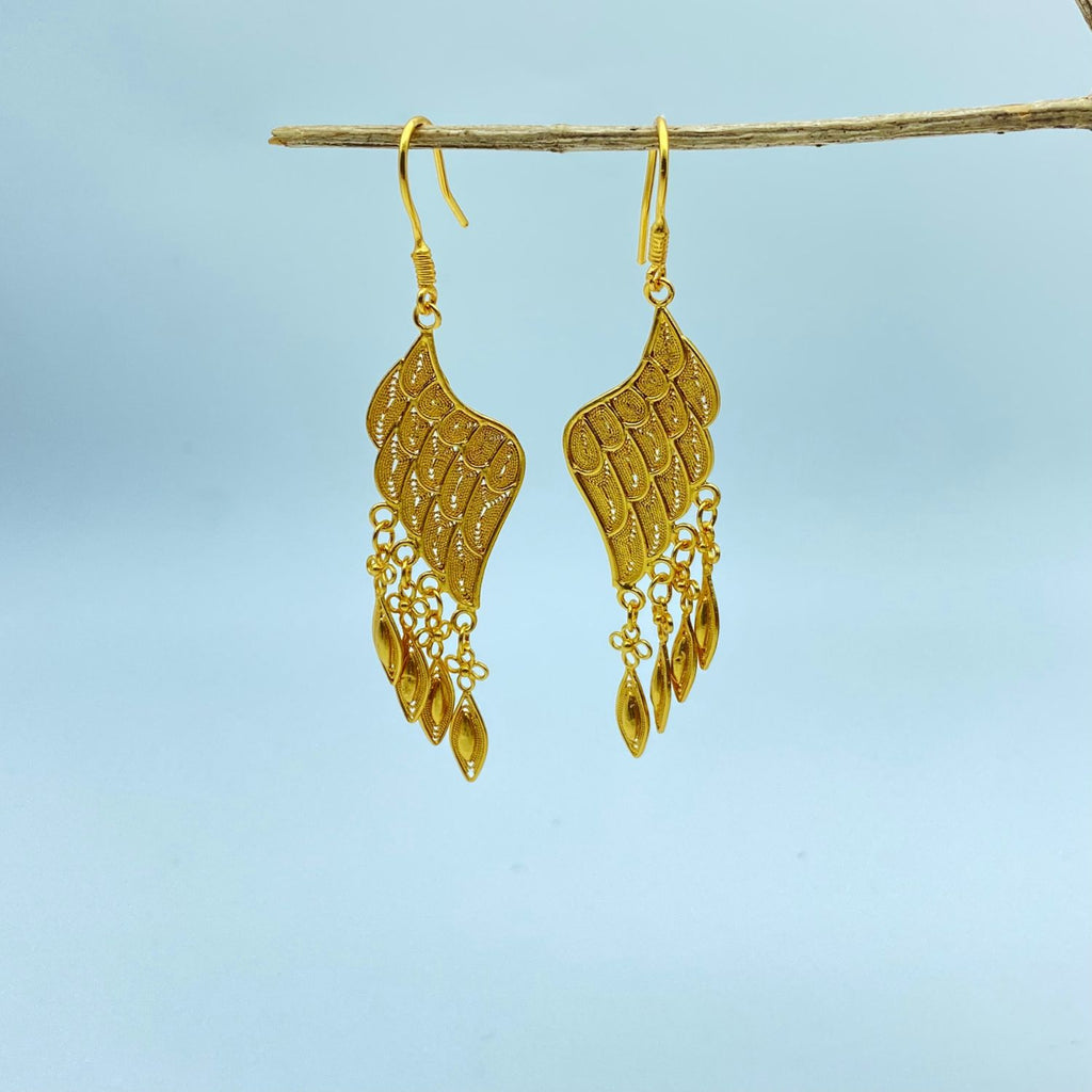 Video showing handmade detail of Imperial Wing layered gold filigree drop earrings with delicate openwork and light-catching drop details by Jinherit.